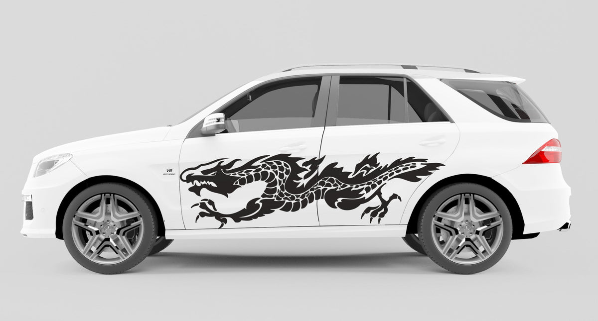 Black flaming dragon vinyl decal on the side of white SUV
